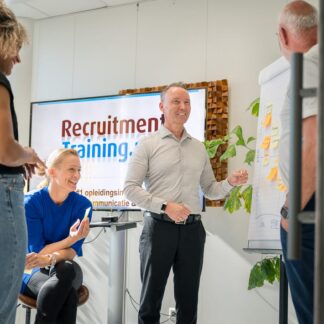 Deelnemers in trainingsruimte tijdens opleiding recruitment