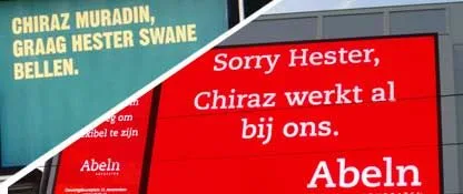 Guerilla recruitment voorbeeld: Billboard duel tussen advocatenkantoren Houthoff en Abeln voor kandidaat Chiraz Muradin